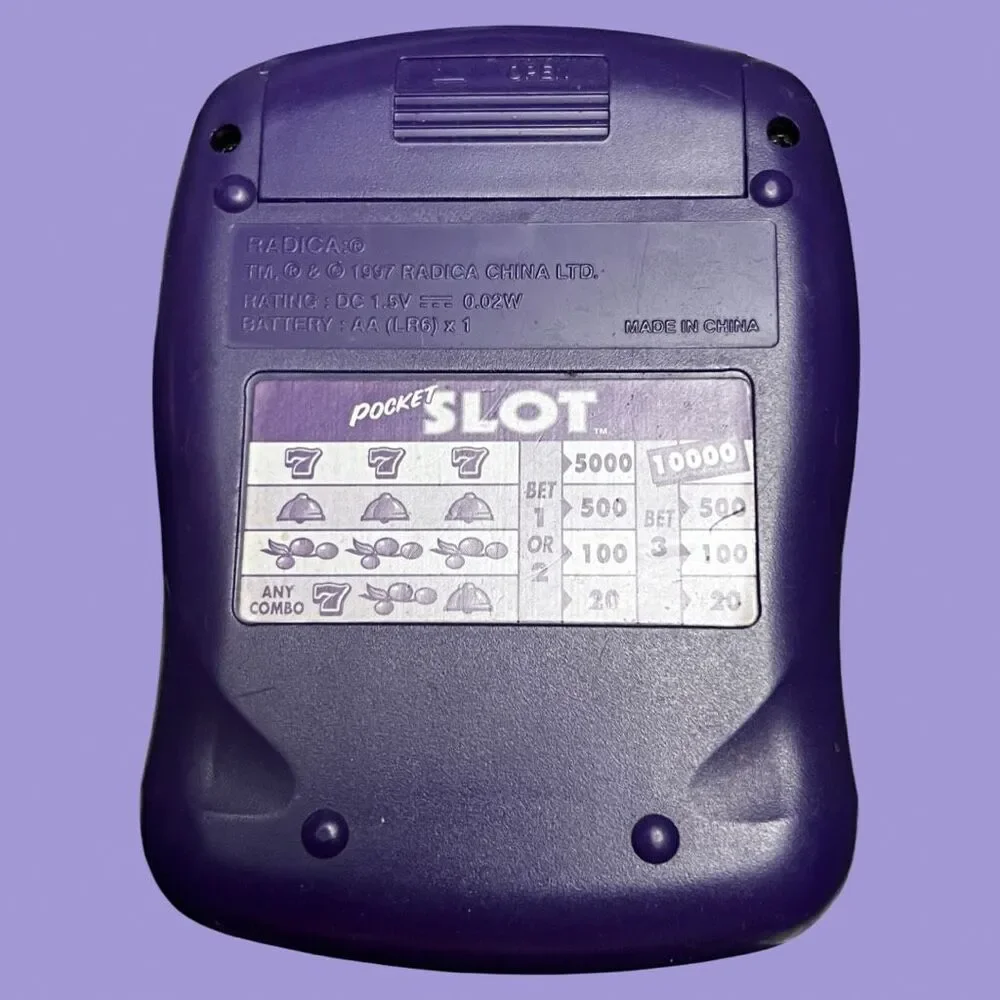 1997 RADICA Pocket Slot Model 9808 Electronic Handheld Portable Game Purple B13
